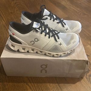 On Cloud running shoes, Cloud X 3, white & black in color, women’s sz 7.
